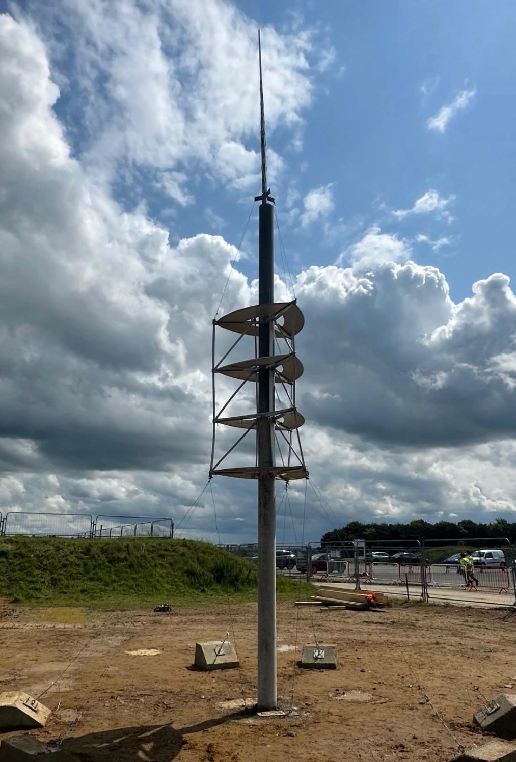 A tall engineering test structure outdoors